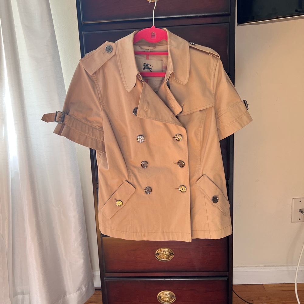 Burberry short sleeve tan  trench jacket.